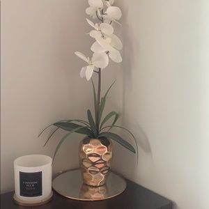 Fake plant in rose gold holder